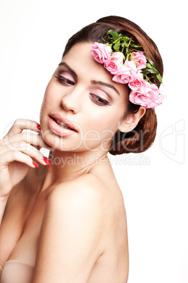 pretty model with flowers on her hair