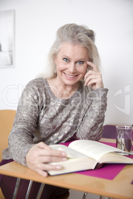 woman reading book