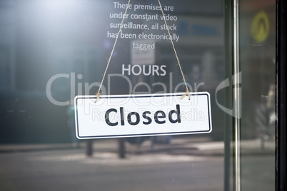 closed sign shop door