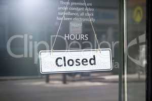 closed sign shop door
