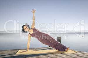 yoga woman at the lake