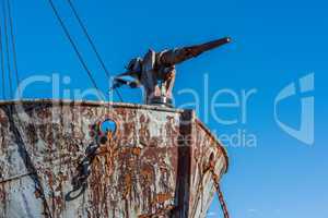 Close-up of harpoon gun on rusty whaler