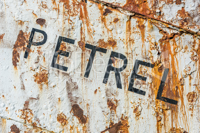 Close-up of name of old rusty ship