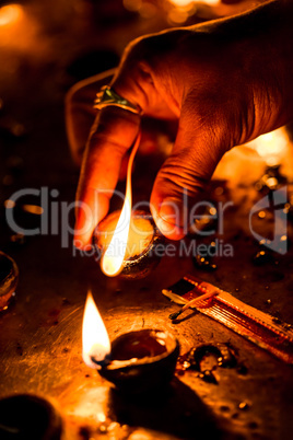 Burning candles in the Indian temple.