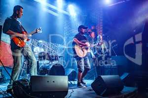 Band performs on stage