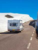 Caravan car travels on the highway.