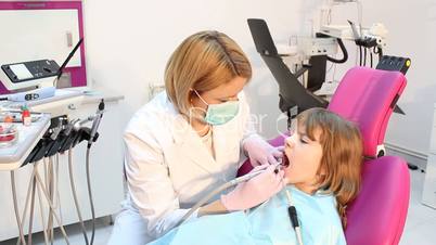 little girl and female dentist