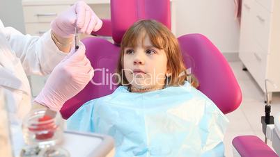scared little girl at the dentist