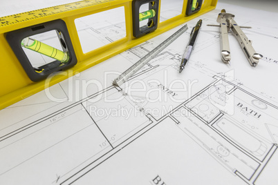 Construction Level, Pencil, Ruler and Compass Resting on House P