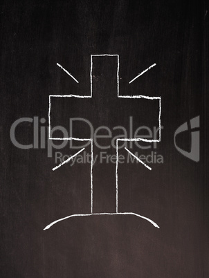 Cross on a chalkboard