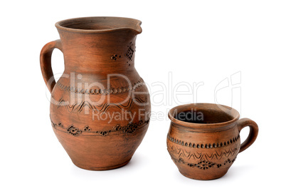 clay jug and mug isolated on white background