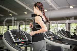 Woman jogging on treadmill