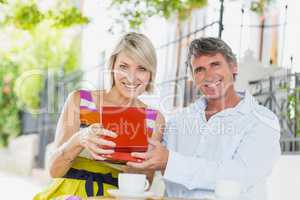 Portrait of couple with present