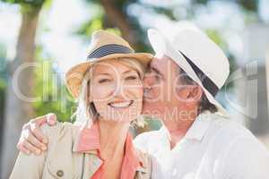 Man kissing woman