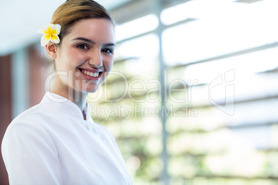 Portrait of smiling masseuse