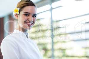 Portrait of smiling masseuse