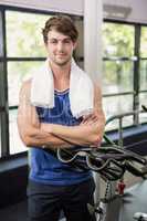 Handsome man standing in gym
