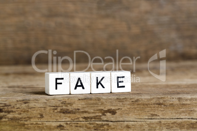 The word fake written in cubes