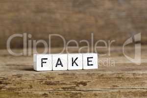 The word fake written in cubes