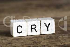 The word cry written in cubes