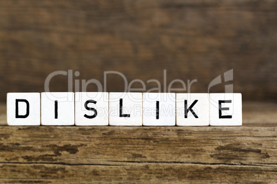 The word dislike written in cubes