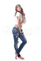 Energetic girl posing in ragged jeans and blouse