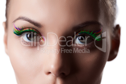 Eyes of young girl with bright makeup, close-up