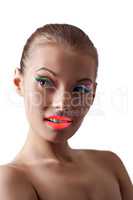 Image of playful young girl with bright UV makeup