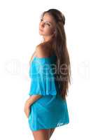 Pretty young girl posing in blue sundress