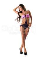 Cute slim model posing in fashionable bikini