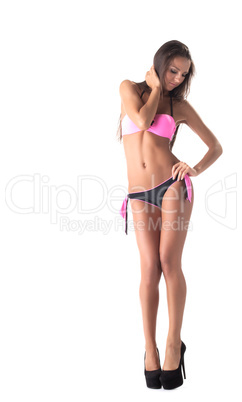 Image of flirtatious stylish girl posing in bikini