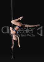 Image of slim graceful pole dancer