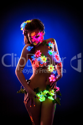 Exciting model posing with UV pattern on body