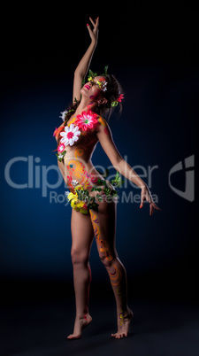 Mysterious girl with flowers and patterns on body