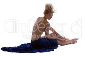 Dreamy blonde posing topless in cloth wound on hip