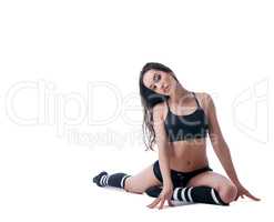 Charming slim woman doing fitness exercise