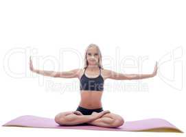 Image of attractive slim woman doing yoga on mat