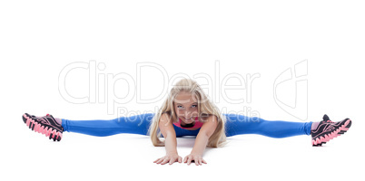 Image of energetic young woman posing on split