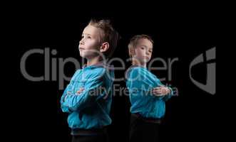 Nice little twins isolated on black background