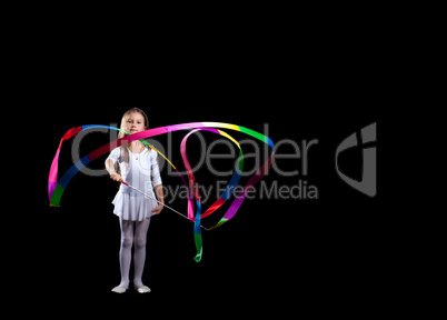 Artistic gymnast dancing with colorful ribbon