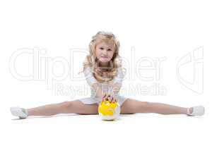 Image of pretty little gymnast posing on split