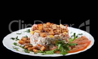 Tasty hearty salad with vegetables and croutons