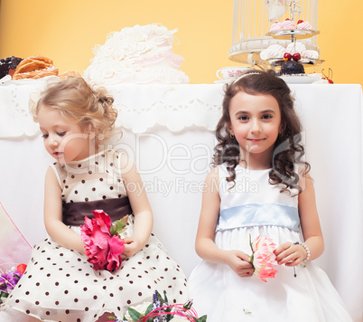 Image of beautiful girls dressed in lush dresses