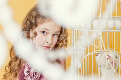 Pretty blue-eyed girl posing looking at camera