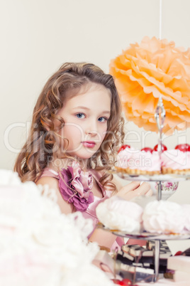 Portrait of beautiful little lady posing in studio