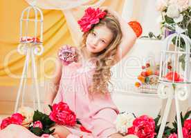 Pretty elegant girl posing in decorated studio