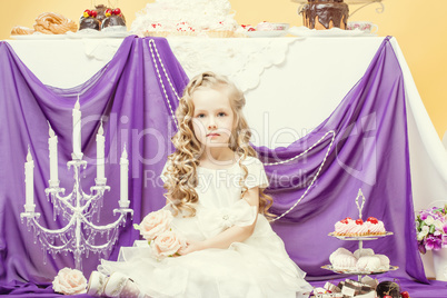 Serious pretty girl posing in festive interior