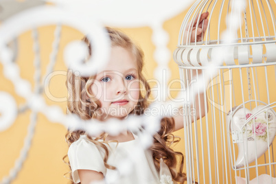 Image of lovely little girl with long curly hair