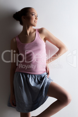 Seductive young woman posing in casual clothes