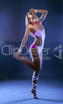 Image of sexy dancer posing in ultraviolet light